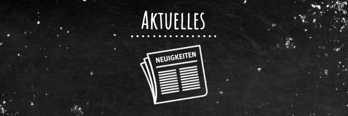 Tafel mit Schriftzug Aktuelles und Kreidebild einer Zeitung